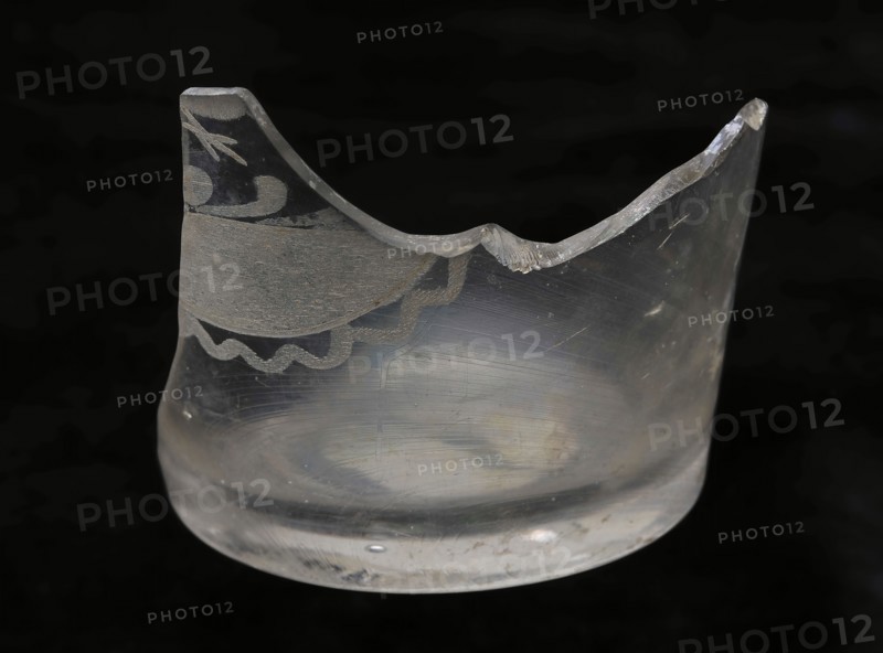 Two fragments of beakers, clear glass, radar engraving and text, pontilmark, beaker glass container holder soil find glass