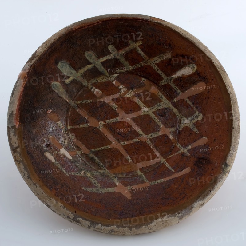 Earthenware plate with yellow waffle pattern in sludge technology, plate crockery holder soil find ceramic earthenware glaze