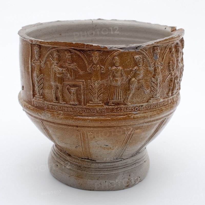 Fragment of stoneware farmer's pitch with dance pairs and text under arcades, farmer's pitcher crockery holder fragment soil