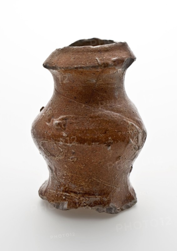 Small stoneware jug with sloping top edge, belly and wide foot, jug crockery holder soil find ceramic stoneware clay engobe