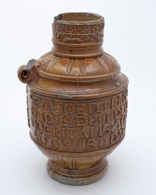 E.M.?, Brown stoneware jug with wide text band around belly and narrow round neck, dated 1568, jug crockery holder soil find