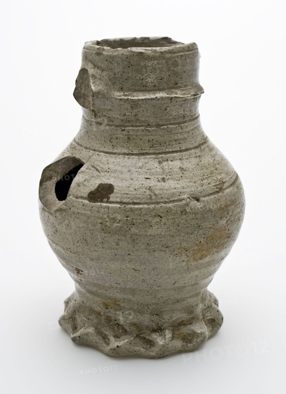 Gray stoneware jug with pinched foot, three deep lines on belly and shoulder, jug crockery holder soil find ceramic stoneware
