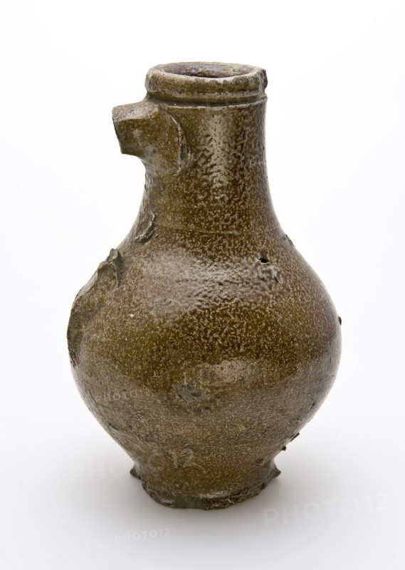 Small stoneware jug with deep lying line under neck edge, bullet-shaped belly, jug holder soil find ceramic stoneware clay