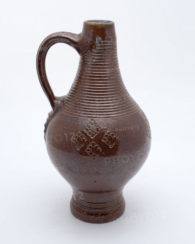 Brown stoneware jug with rings around neck, belly decorated with stamped square ornaments, jug crockery holder soil find ceramic