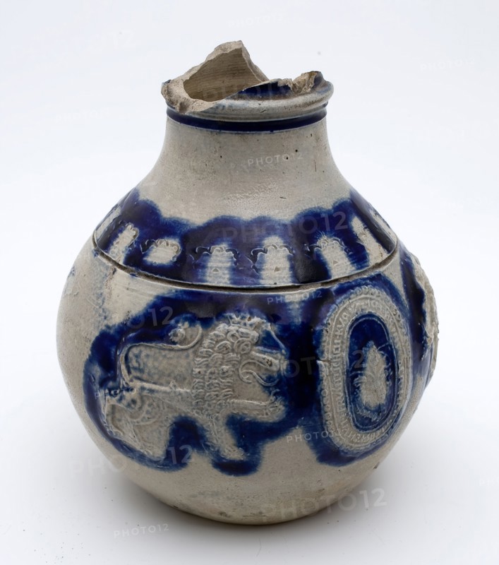 Stoneware bullet tomb with medallion flanked by lions with rim text, dated, Bullet pewter jug crockery holder soil find ceramic