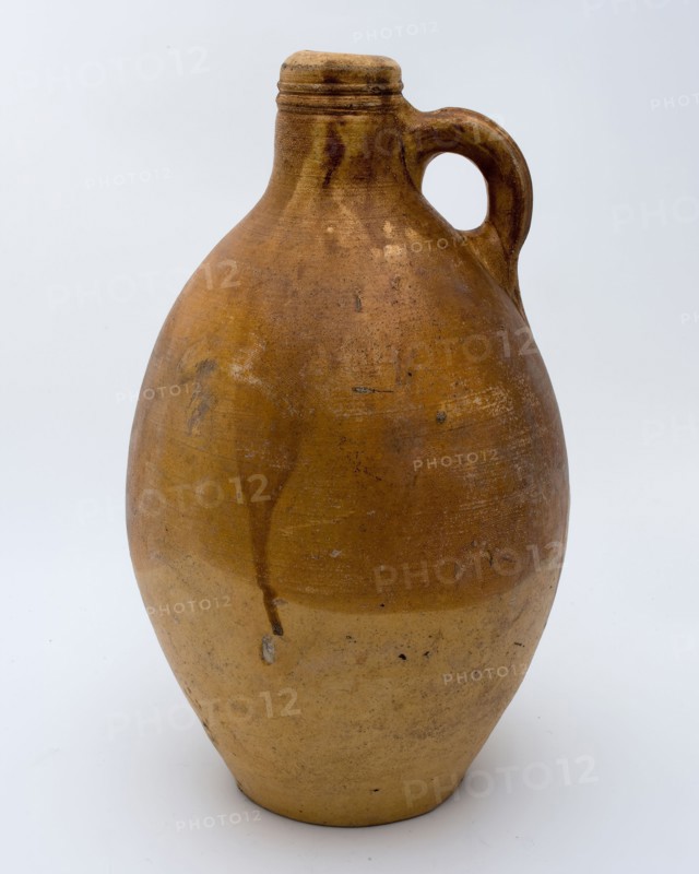 Light brown jug with band ear and tail, jug crockery holder soil find ceramic stoneware glaze salt glaze, hand turned fried