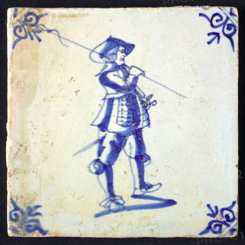White tile with blue warrior; corner pattern ox head, wall tile tile sculpture ceramic earthenware glaze, baked 2x glazed