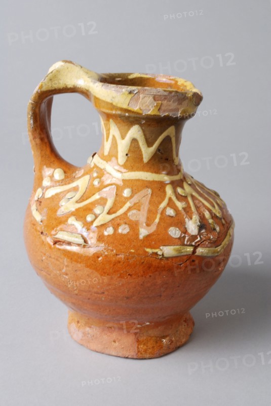 Earthenware oil jug on stand with standing ear and clip, sludge on the neck and shoulder, oil jug holder kitchen utensils