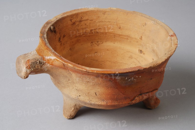 Pottery stem bowl, fire test, red shard with some tears lead glaze, short handle, on three legs, fire test bowl