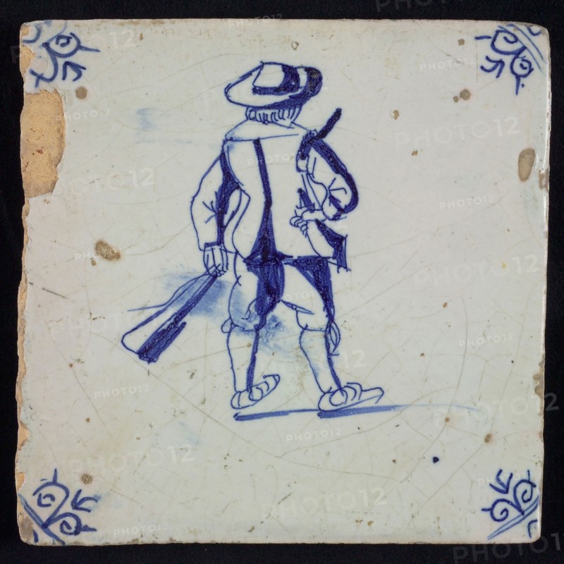 White tile with blue warrior; corner pattern ox head, wall tile tile sculpture ceramic earthenware glaze, baked 2x glazed