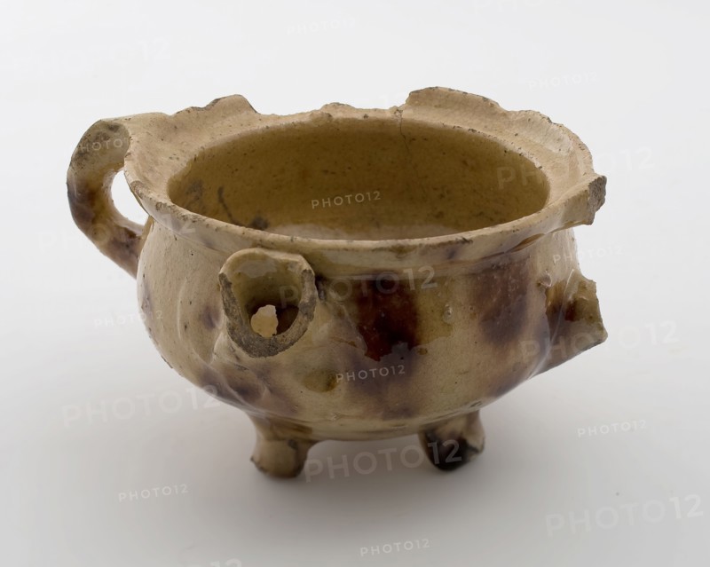 Pottery toy room pot, white shard, glazed in yellow and brown, two sausage ears, spout, on three legs, spout pottery pottery