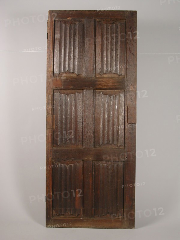 Room door with letter panels, door building part oak wood, sawn planed chiselled Gothic room door with six letter panels