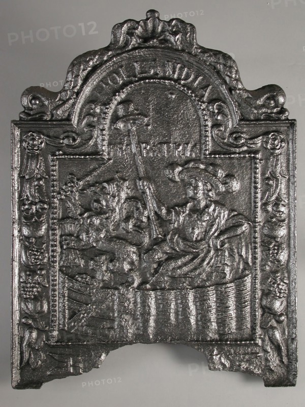 Fireback Dutch Virgin in garden, text Hollandia pro patria, hob plate cast iron, cast Rectangular arch at the top.
