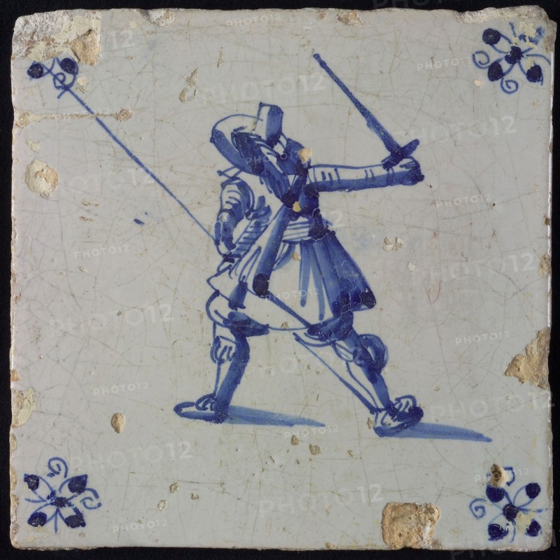 White tile with blue warrior; corner motif spider, wall tile tile footage ceramic earthenware glaze, baked 2x glazed painted
