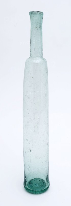 Elongated cylindrical supply bottle, pharmacy bottle perfume bottle holder soil find glass, free blown and shaped Oblong storage