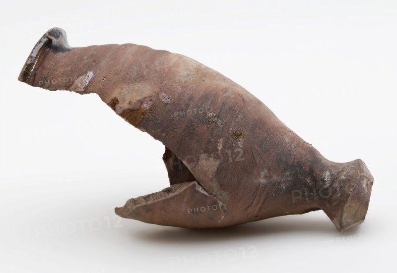Fragment of pottery drink with glazed mouth rim, on stand button, pouring cup cup drinking utensils tableware holder earth