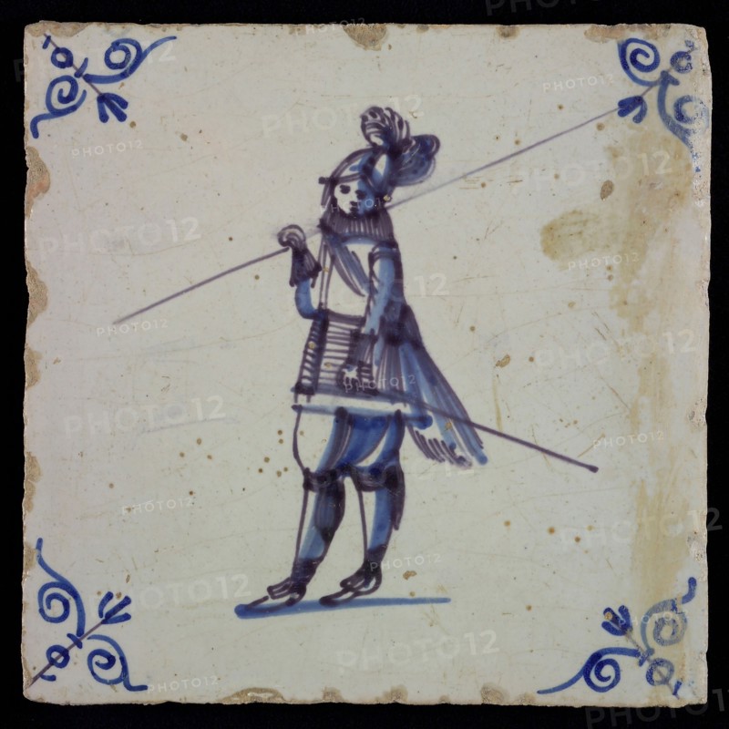 White tile with blue warrior; corner pattern ox head, wall tile tile sculpture ceramic earthenware glaze, baked 2x glazed