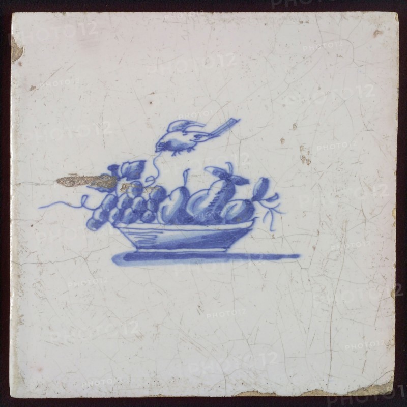 White tile with blue fruit basket with grapes and bird, wall tile tile sculpture ceramics pottery glaze, baked 2x glazed painted