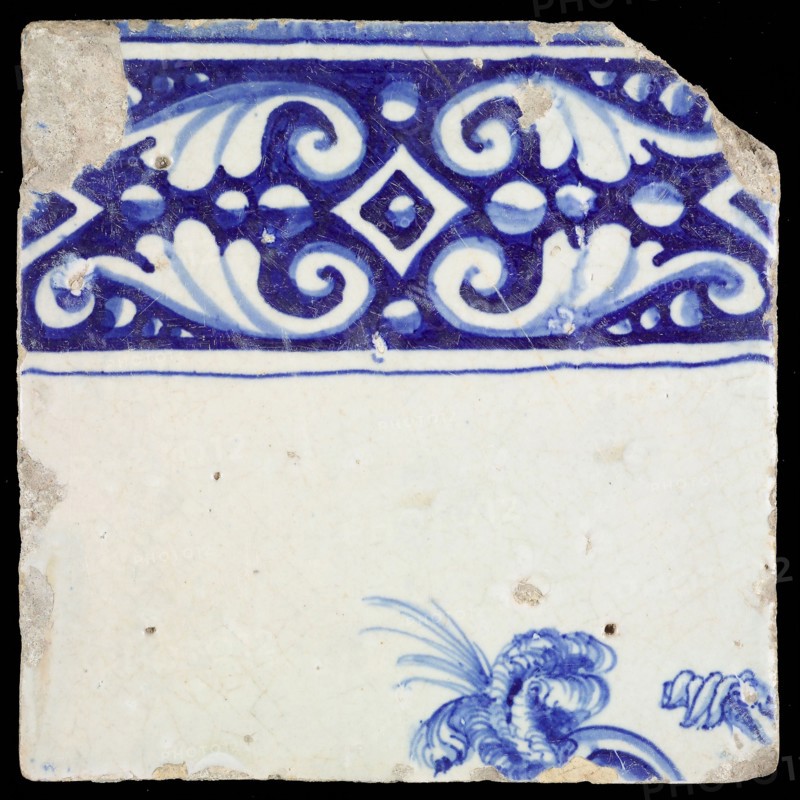 Tile, in blue on white, above ornament edge, underneath part of the head of soldier with helmet and plume, tile picture footage