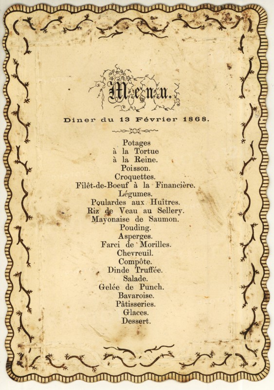 Menu card with scalloped edge, decorated with gold-colored ornaments and with printed French text, menu card information form