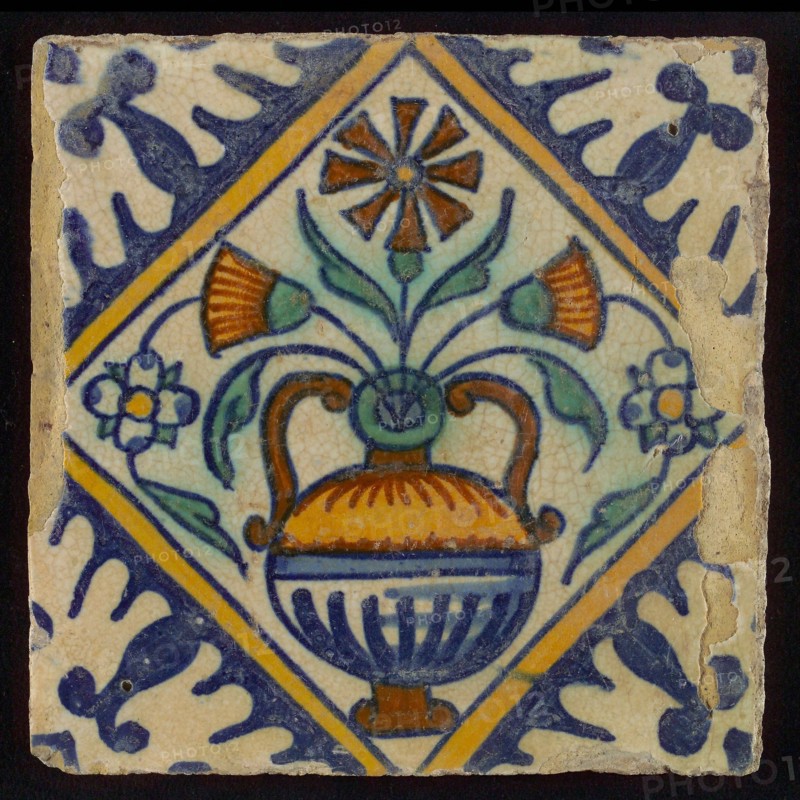 Tile, orange, brown, green and blue on white, flowerpot in square, corner pattern palmet, wall tile tile sculpture ceramic