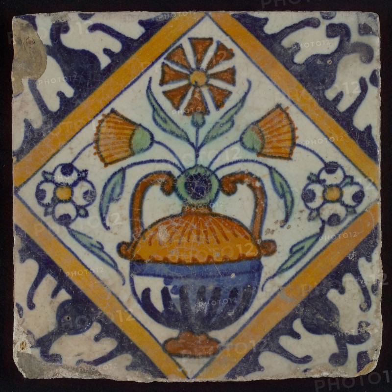 Tile, orange, brown, green, and blue on white, flowerpot in square, corner pattern palm, wall tile tile image ceramics