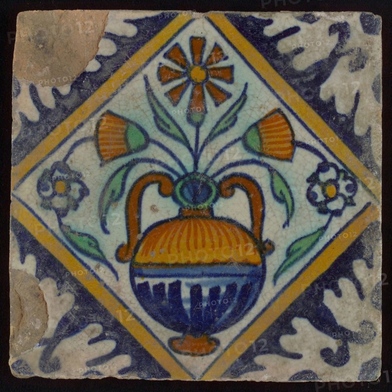 Tile, orange, brown, green, and blue on white, flowerpot in square, corner pattern palmet, wall tile tile sculpture ceramic