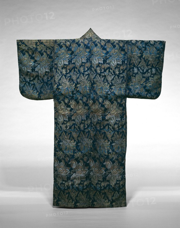 Kosode, Edo period (1615–1868), 1775/1800, Japan, Silk and gold-leaf-over-lacquered-paper strips, warp-float faced twill weave with weft float faced twill interlacings of secondary binding warps and supplementary patterning wefts, interlined with cotton, plain weave, 164 × 133.7 cm (64 1/2 × 52 5/8 in.)