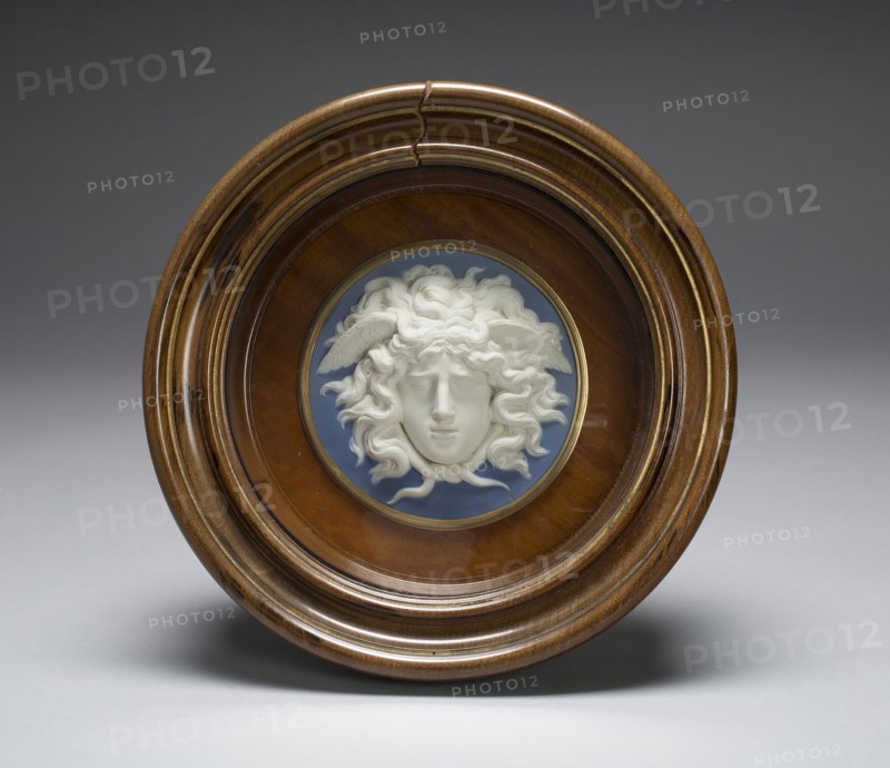 Medusa, 1775/80, Wedgwood Manufactory, England, founded 1759, Modeled by John Flaxman, Jr., English, 1755-1826, Etruria, Staffordshire, England, Etruria, Stoneware (jasperware), gilded wooden frame, 25.9 × 26 × 0.8 cm (10 3/16 × 10 1/4 × 5/16 in.)