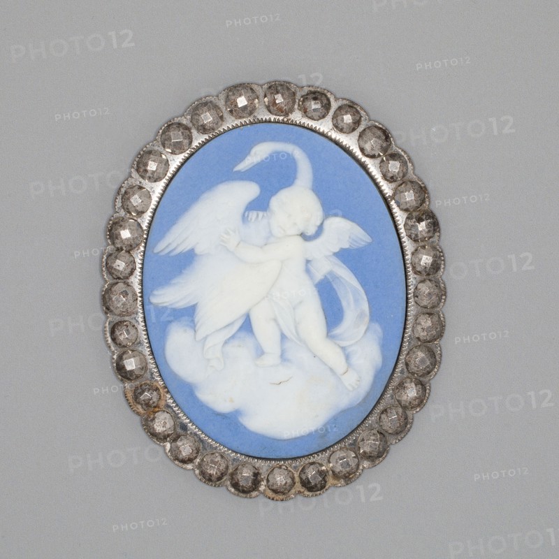 Medallion with Cupid and Swan, Late 18th century, Wedgwood Manufactory, England, founded 1759, Burslem, Stoneware (jasperware), 8.3 × 6.8 × 0.6 cm (3 1/4 × 2 11/16 × 1/4 in.)