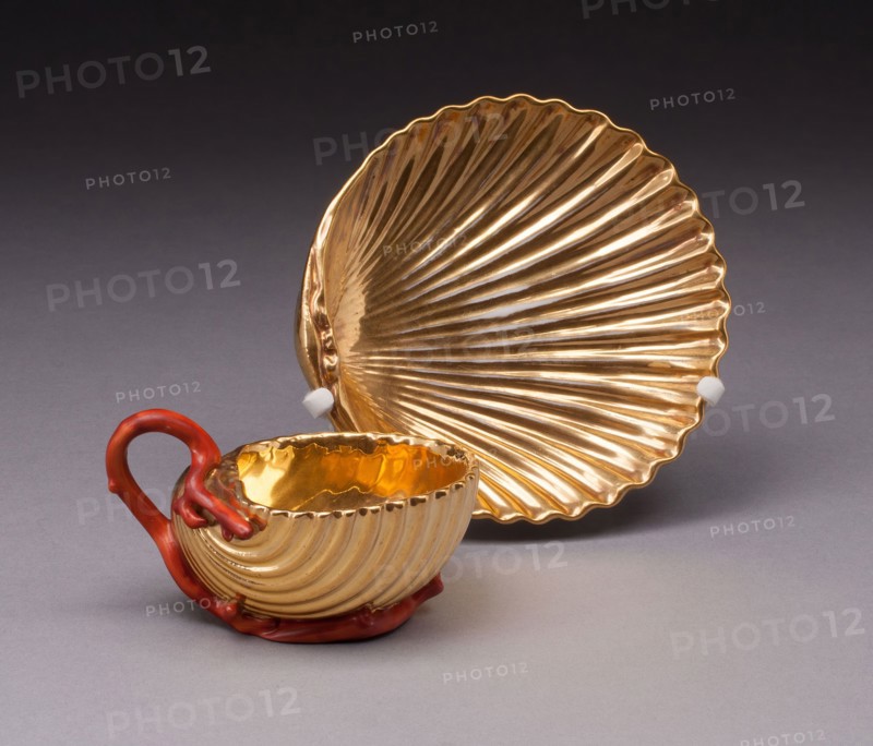 Cup and Saucer, 1810/15, Pierre Louis Dagoty, French, 1771-1840, Paris, Paris, Hard-paste porcelain, red enamel and gilding, Cup: 5.7 × 9.8 cm (2 1/4 × 3 7/8 in.), saucer: D. 3.2 cm (1 1/4 in.), diam. 13 cm (5 1/8 in.)