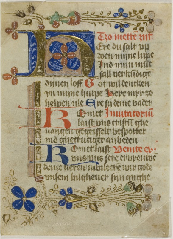 Illuminated Initial H from a Prayerbook, 15th century, Northern German (possibly Munster), Germany, Manuscript cutting in tempera and gold leaf, with Plattdeutsch inscriptions in light brown, red and blue inks, on parchment, 120 x 88 mm