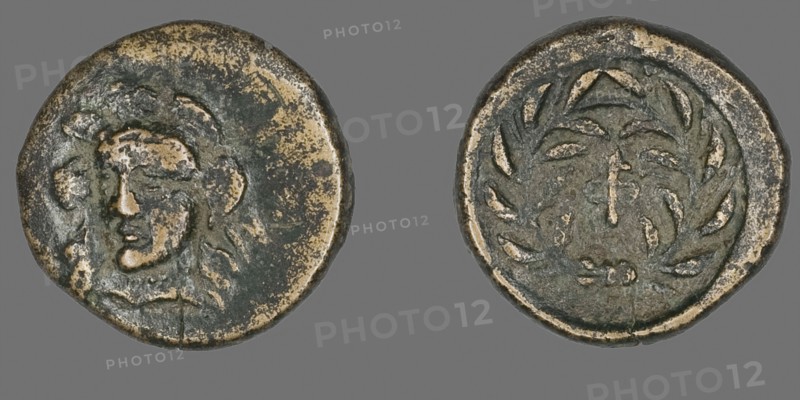 Coin Depicting the Goddess Athena, 371/357 BC, Greek, minted in Phocis, Ancient Greece, Bronze, Diam. 1.6 cm, 2.66 g