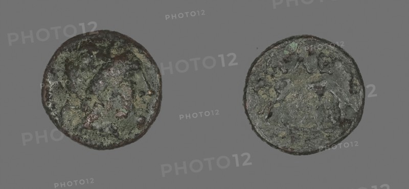 Coin Depicting the God Apollo, 3rd/2nd century BC, Greek, Ancient Greece, Bronze, Diam. 1.2 cm, 1.15 g