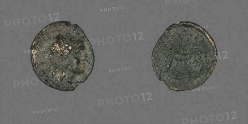 Coin Depicting the God Apollo, 3rd/2nd century BC, Greek, Ancient Greece, Bronze, Diam. 1.8 cm, 2.85 g