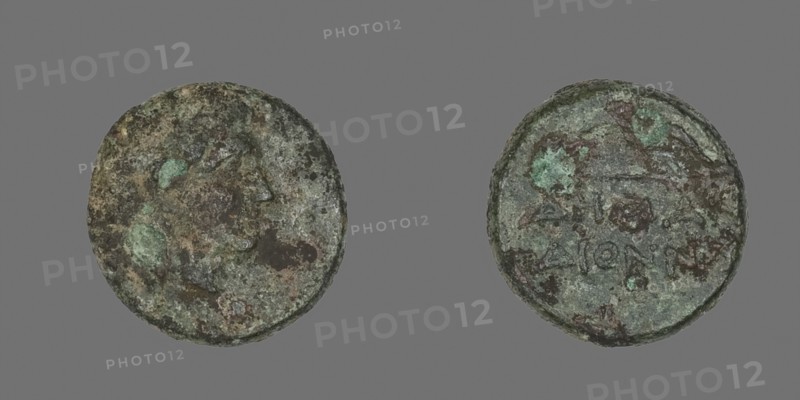 Coin Depicting the God Apollo, about 300/200 BC, Greek, Ancient Greece, Bronze, Diam. 1.2 cm, 1.89 g