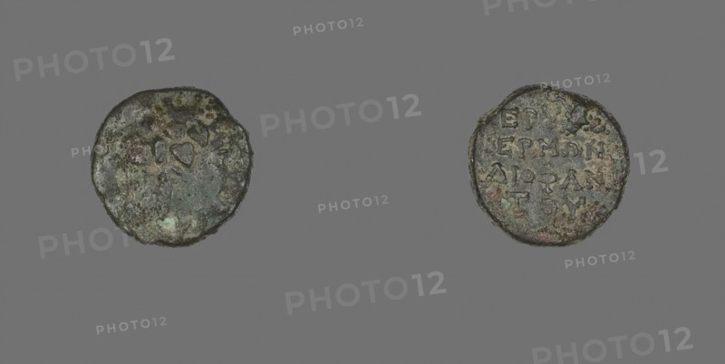 Coin Depicting the God Dionysos, 300/200 BC, Greek, Ancient Greece, Bronze, Diam. 1.4 cm, 2.71 g