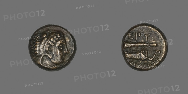 Coin Depicting the Hero Herakles, 4th century BC and later, Greek, minted in Erythrae, Ionia, Greece, Bronze, Diam. 1.1 cm, 2.27 g