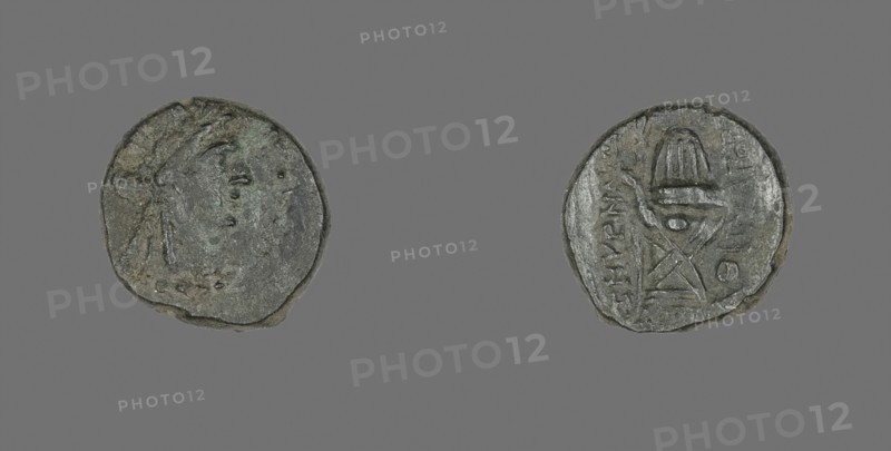 Coin Depicting the God Apollo, 75/50 BC (?), Greek, minted in Smyrna, Ionia, Ancient Greece, Bronze, Diam. 1.5 cm, 3.34 g