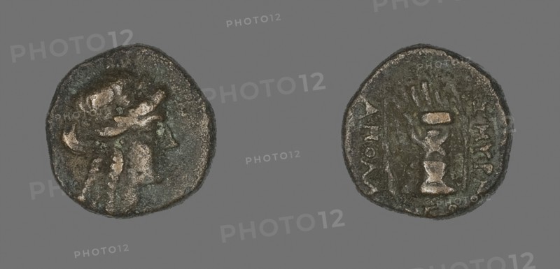 Coin Depicting the God Apollo, 2nd/1st century BC, Greek, minted in Smyrna, Ionia, Ancient Greece, Bronze, Diam. 1.2 cm, 2.02 g