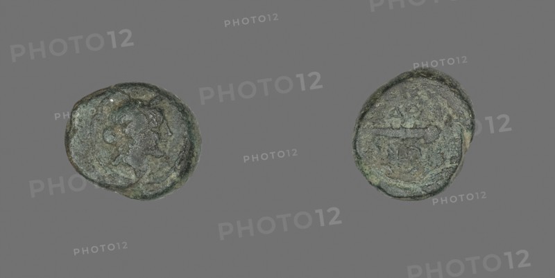 Coin Depicting the God Apollo, about 133 BC, Greek, Ancient Greece, Bronze, Diam. 1.5 cm, 3.93 g