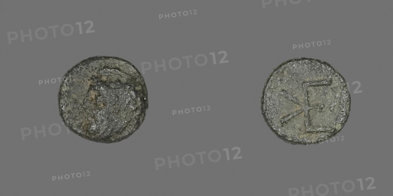 Coin Depicting Head of a Male, 400/310 BC, Greek, Ancient Greece, Bronze, Diam. 0.9 cm, 0.71 g