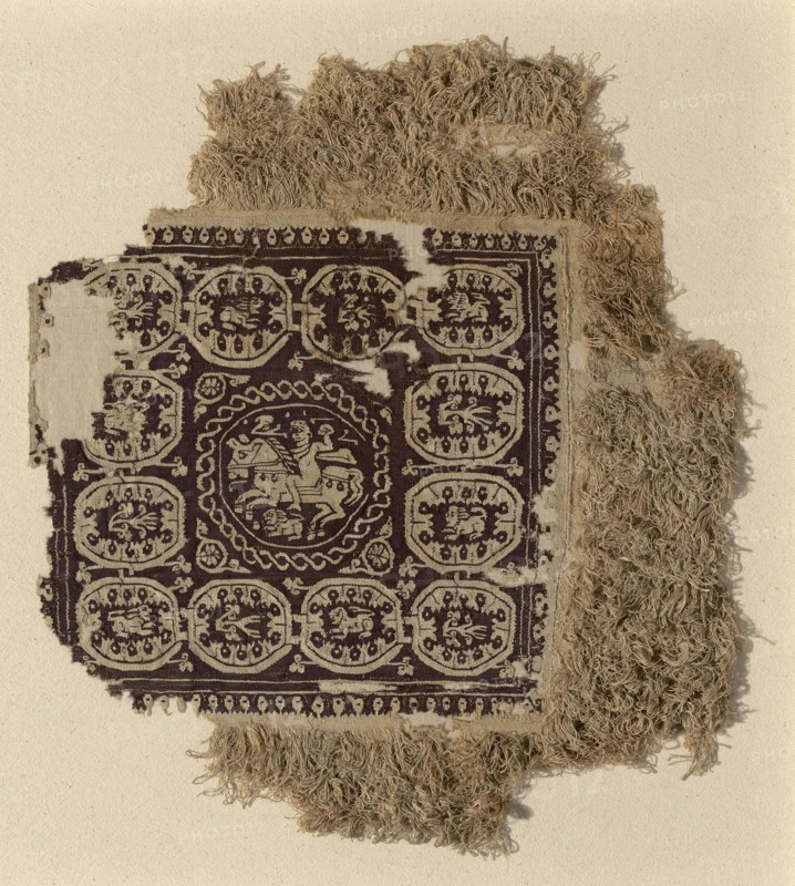 Fragment, Roman period (30 B.C.–641 A.D.), 4th/5th century, Egypt, Akhmin, Egypt, Linen and wool, slit and dovetailed tapestry weave with eccentric wefts and supplementary wrapping weft details, edged by plain weave with supplementary wrapping wefts forming uncut loop pile, 59.2 × 51 cm (23 1/4 × 20 1/8 in.)