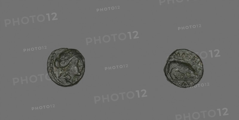 Coin Depicting the God Apollo, after 250 BC, Greek, Greece, Bronze, Diam. 1.3 cm, 1.89 g