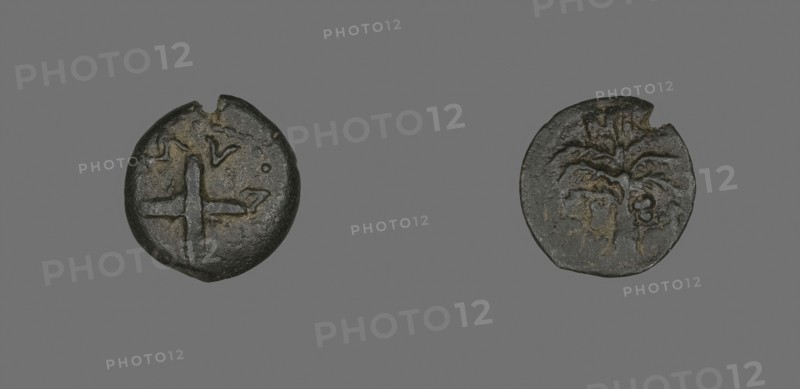 Coin Depicting Shields and Spears, AD 54, Procurator: Antonius Felix (reign of Claudius), Roman, Palestine, Israel, Bronze, Diam. 1.8 cm, 2.33 g