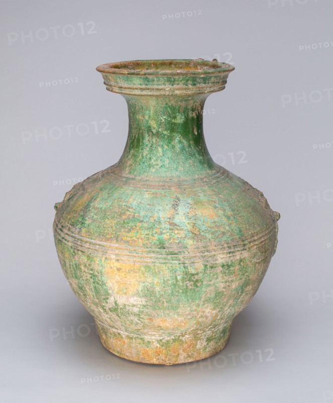 Globular Jar with Mock Ogre Mask Ring Handles, Han dynasty (206 B.C.–A.D. 220), China, Earthenware with underglaze molded decoration and lead green glaze, H. 39.1 cm (15 3/8 in.), diam. 30.7 cm (12 1/8 in.)