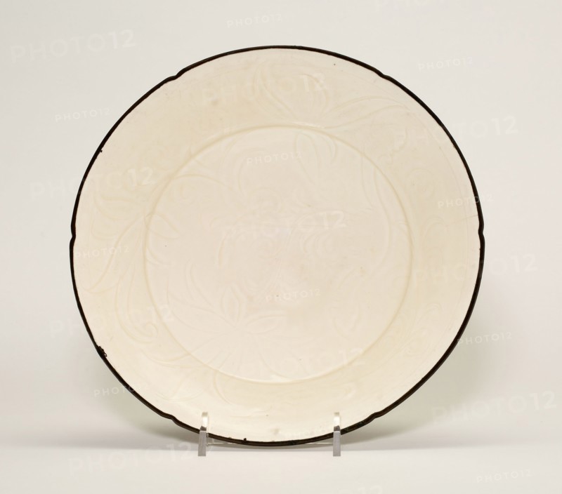 Dish with Lotus Flowers, Song dynasty (960–1279), China, Ding ware, porcelain with underglaze carved decoration, metal rim, H. 5.3 cm (2 1/16 in.), diam. 21.0 cm (8 1/4 in.)
