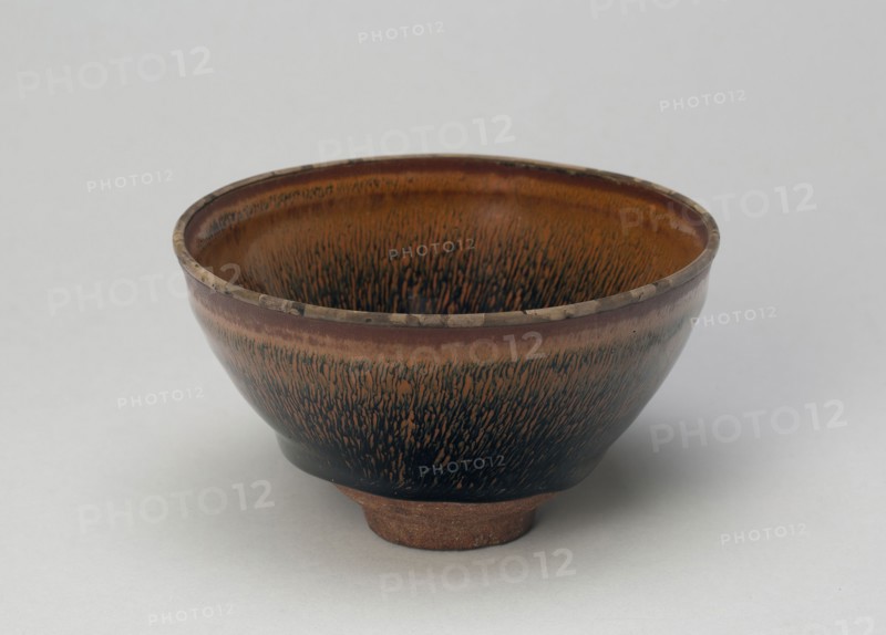 Tea Bowl, Song dynasty (960–1279), 12th century, China, Fujian Province, China, Jian ware, dark-gray stoneware with dark-brown glaze and overglaze hare’s fur markings in iron oxide, H. 7.5 cm (2 15/16 in.), diam. 12.2 cm (4 15/16 in.)