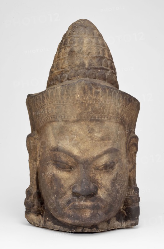 Head of a Male Deity (Deva), Angkor period, late 12th–early 13th century, Cambodia, Angkor Thom, Bayon Temple, Cambodia, Sandstone, 87.0 × 45.7 × 40.6 cm (34 1/4 × 18 × 16 in.)