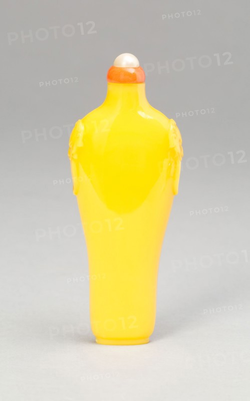 Snuff Bottle with Mock Lion Mask Handles, Qing dynasty (1644–1911), 1730–1790, China, Imperial yellow glass, 7.6 × 3.2 × 1.4 cm (3 × 1 1/4 × 5/8 in.)